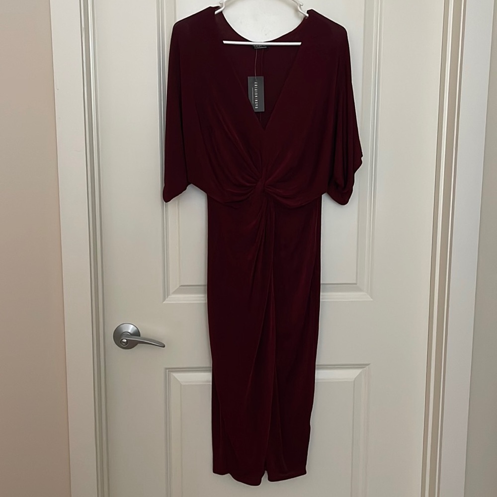 Burgandy fashion nova party or wedding guest dress.